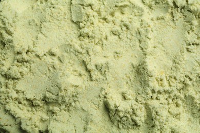 Photo of Dry wasabi powder as background, top view