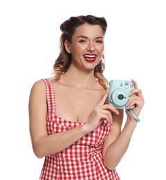 Photo of Happy pin-up woman with camera on white background