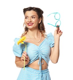 Photo of Happy pin-up woman with flower and glasses on white background