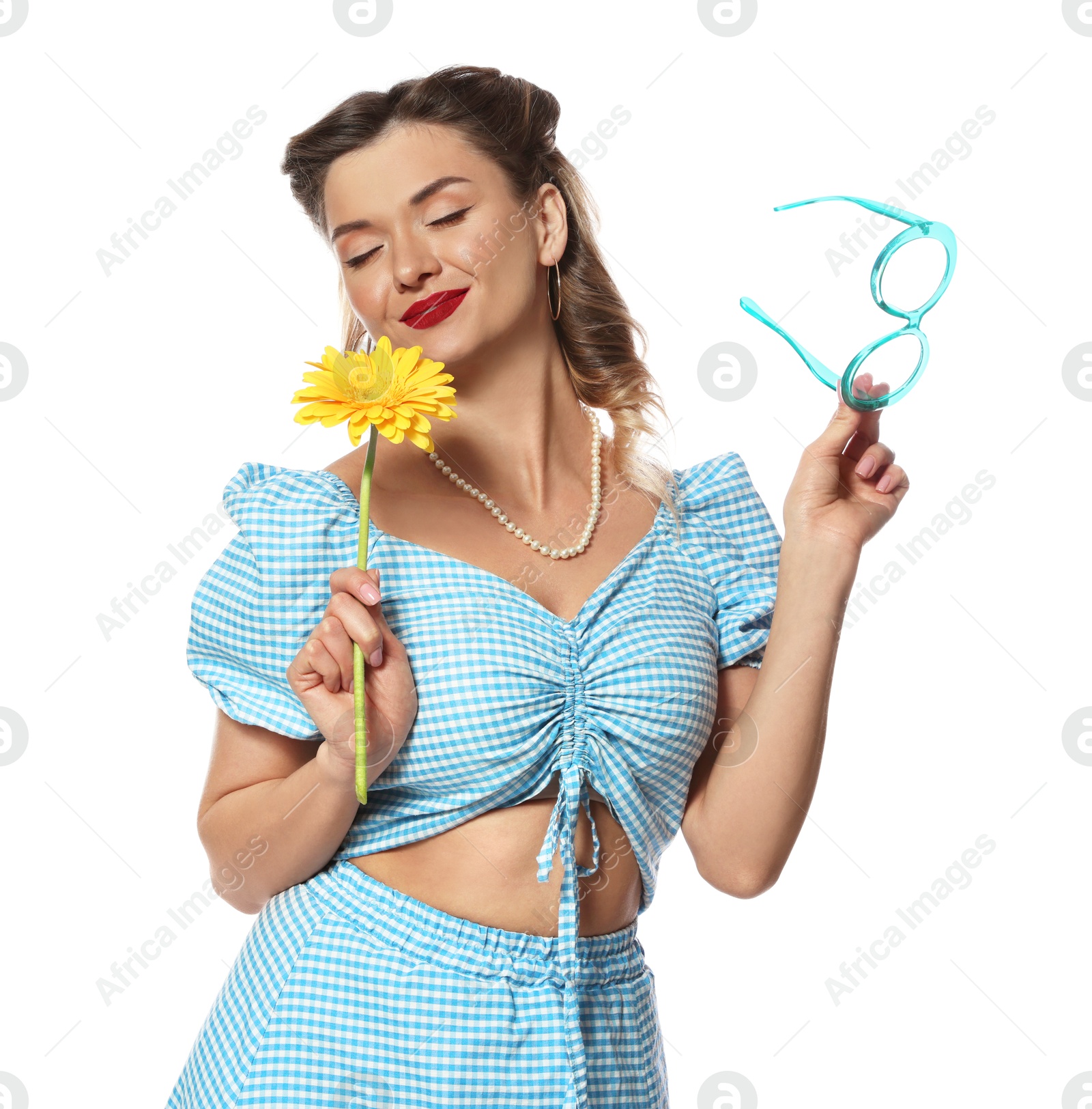 Photo of Attractive pin-up woman with flower and glasses on white background