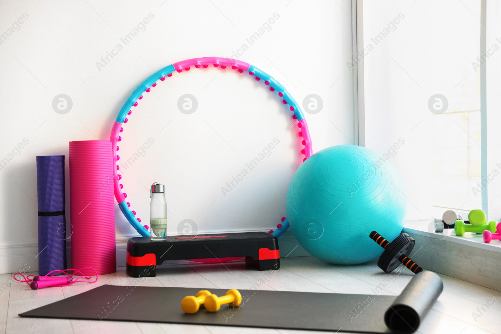 Photo of Many different fitness equipment and accessories indoors