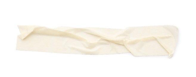 Photo of Strip of masking tape isolated on white, top view