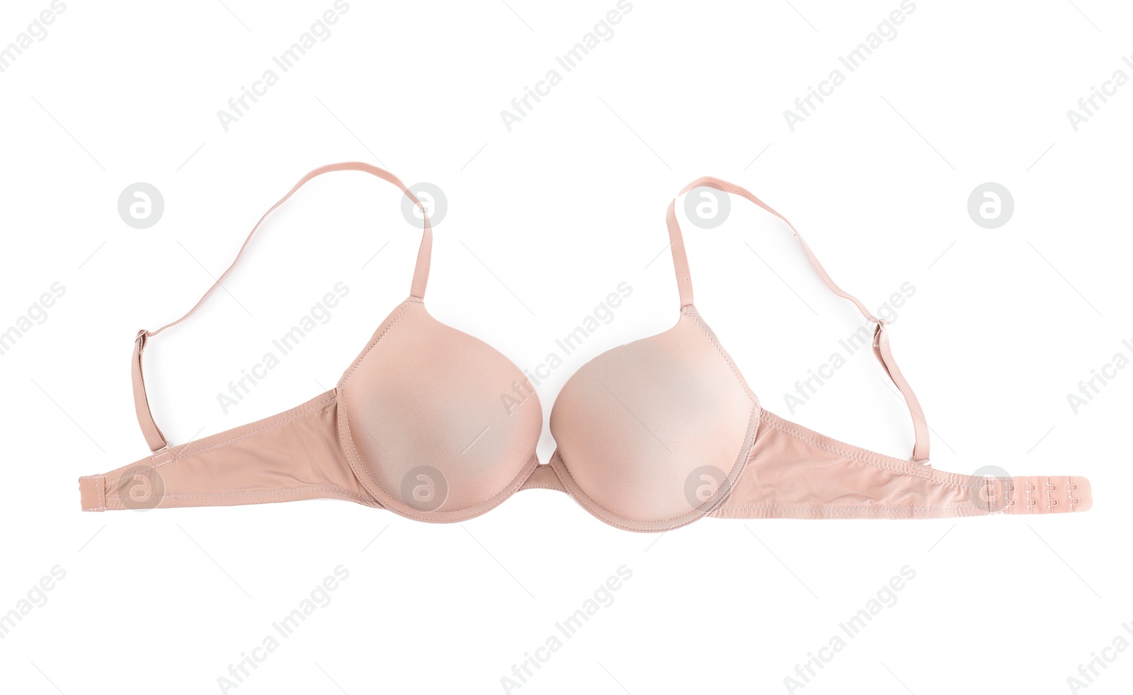 Photo of Beautiful beige bra isolated on white, top view