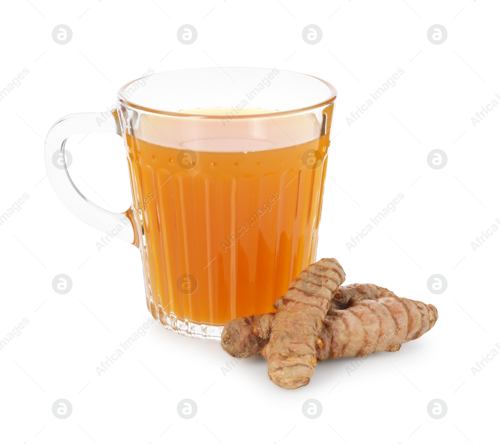 Photo of Aromatic turmeric tea in glass cup and roots isolated on white