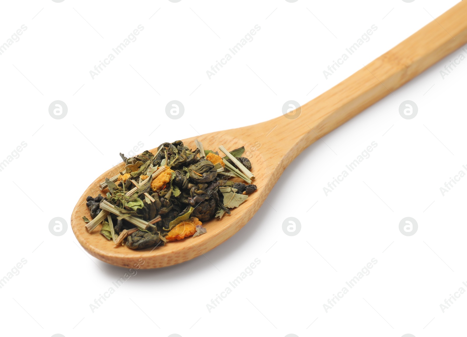 Photo of Dry tea leaves in wooden spoon isolated on white