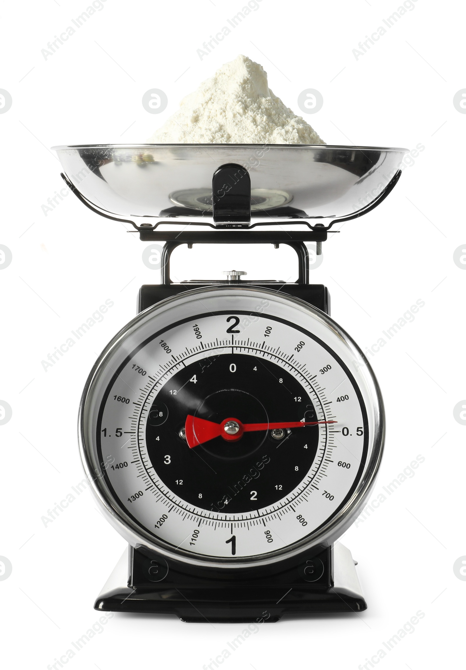 Photo of Retro mechanical kitchen scale with flour isolated on white