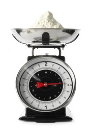 Photo of Retro mechanical kitchen scale with flour isolated on white