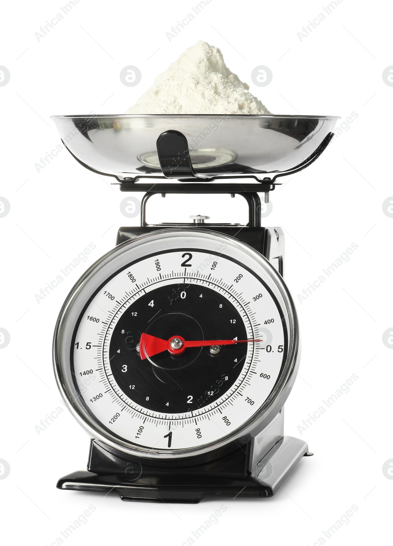 Photo of Retro mechanical kitchen scale with flour isolated on white