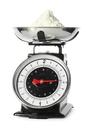 Retro mechanical kitchen scale with flour isolated on white