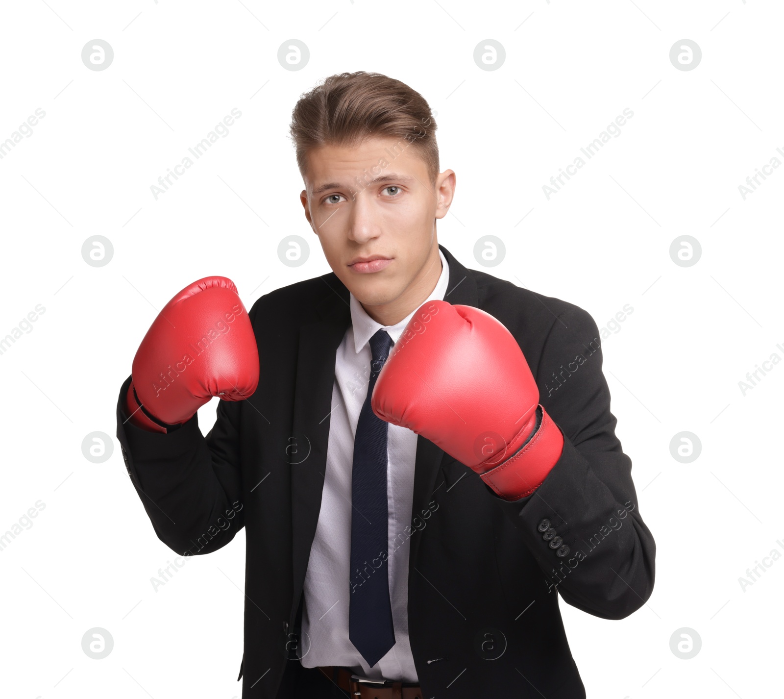 Photo of Competition. Businessman in suit wearing boxing gloves on white background