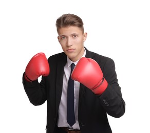 Photo of Competition. Businessman in suit wearing boxing gloves on white background