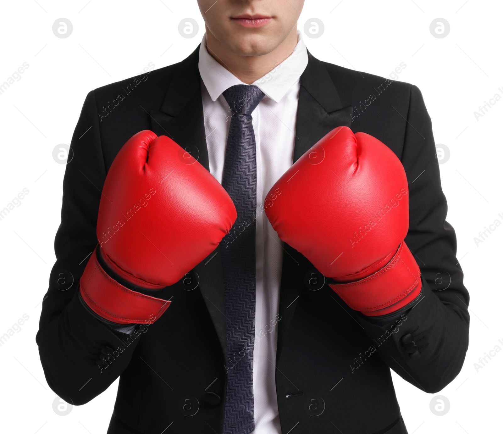 Photo of Competition. Businessman in suit wearing boxing gloves on white background, closeup