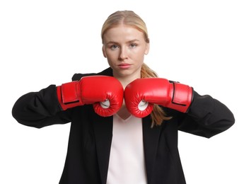 Photo of Competition. Businesswoman in suit wearing boxing gloves on white background