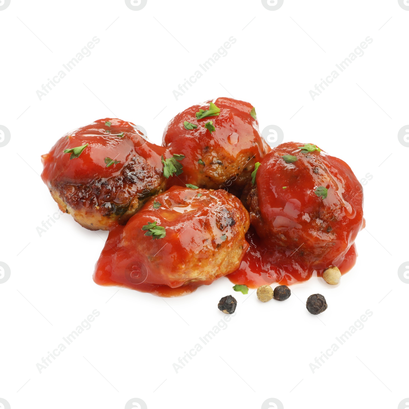 Photo of Delicious meatballs with tomato sauce and spices isolated on white