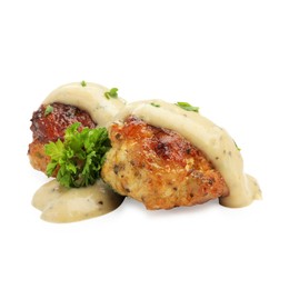 Photo of Delicious meatballs with creamy sauce isolated on white