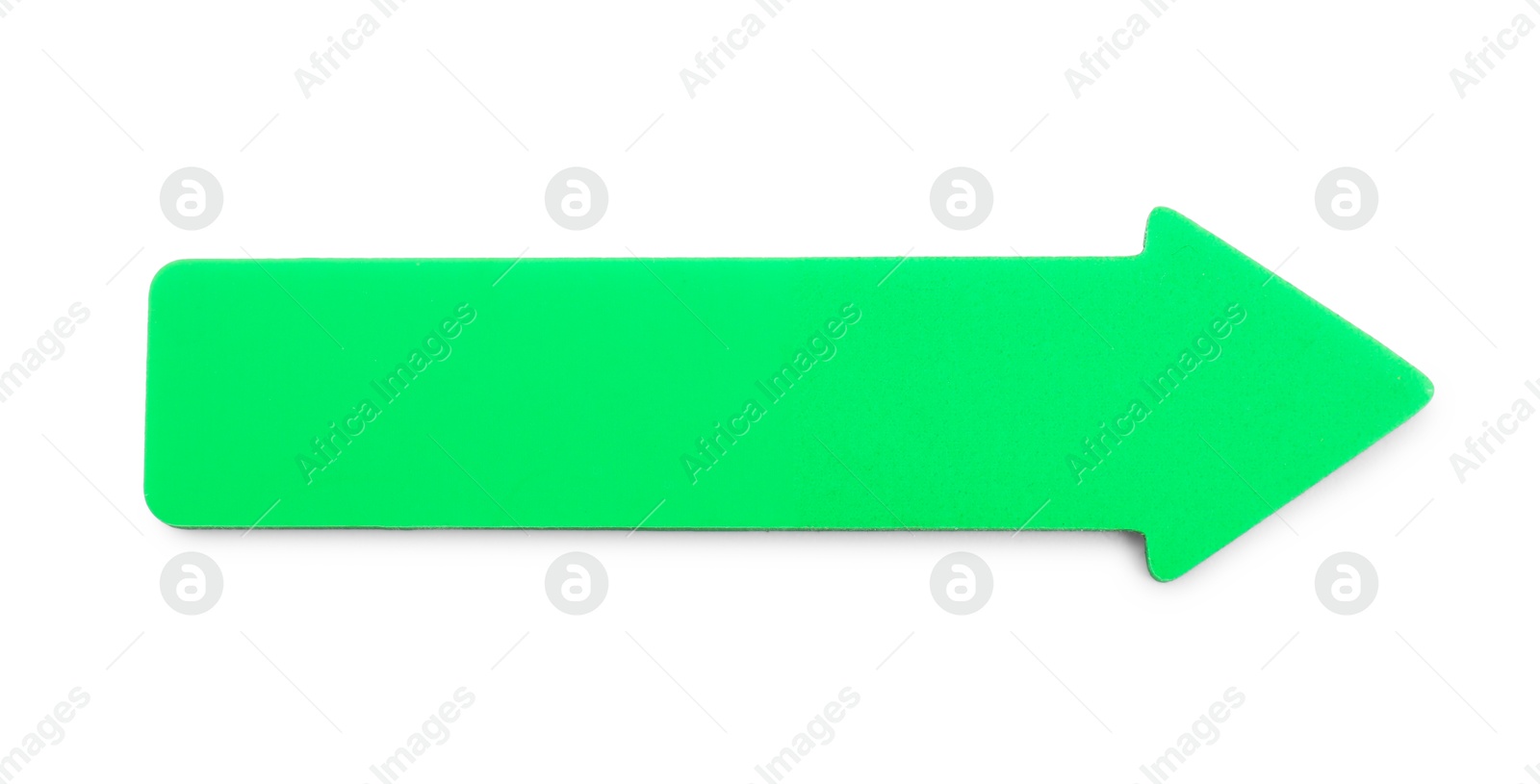 Photo of One green paper arrow isolated on white, top view