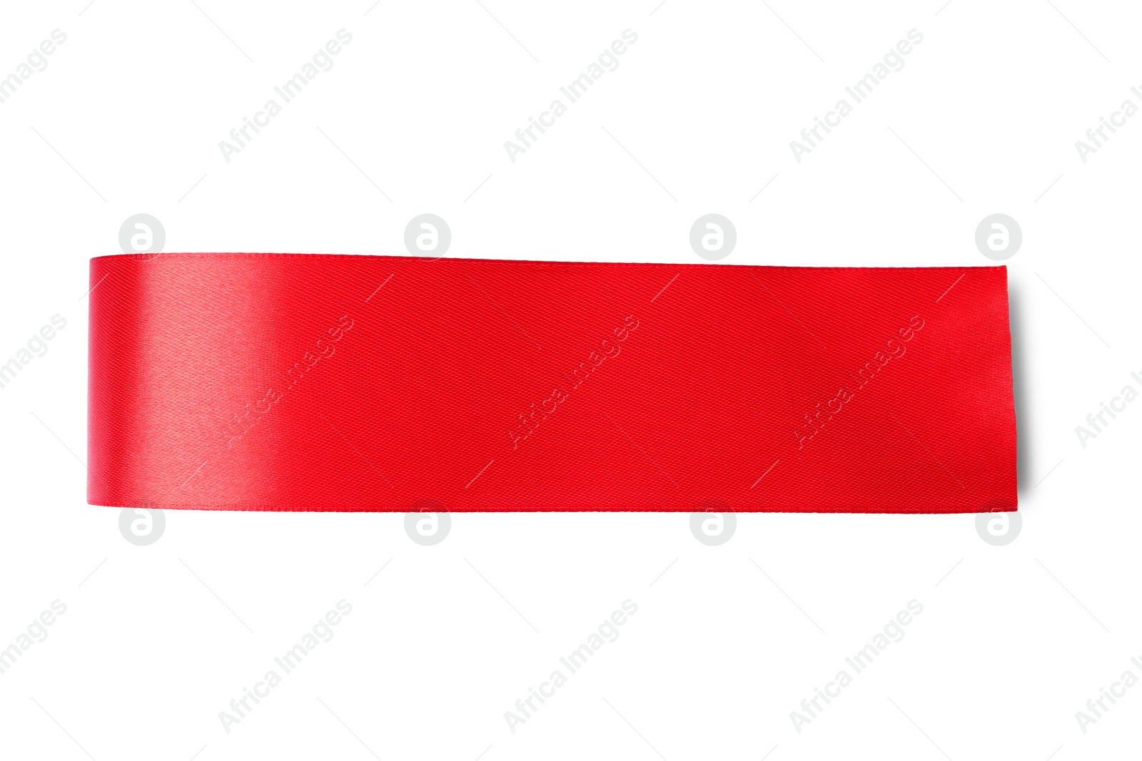 Photo of Red ribbon bookmark isolated on white, top view