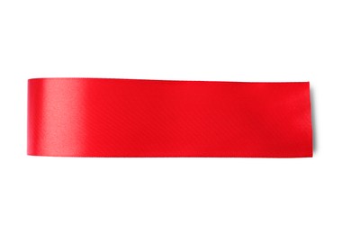 Photo of Red ribbon bookmark isolated on white, top view