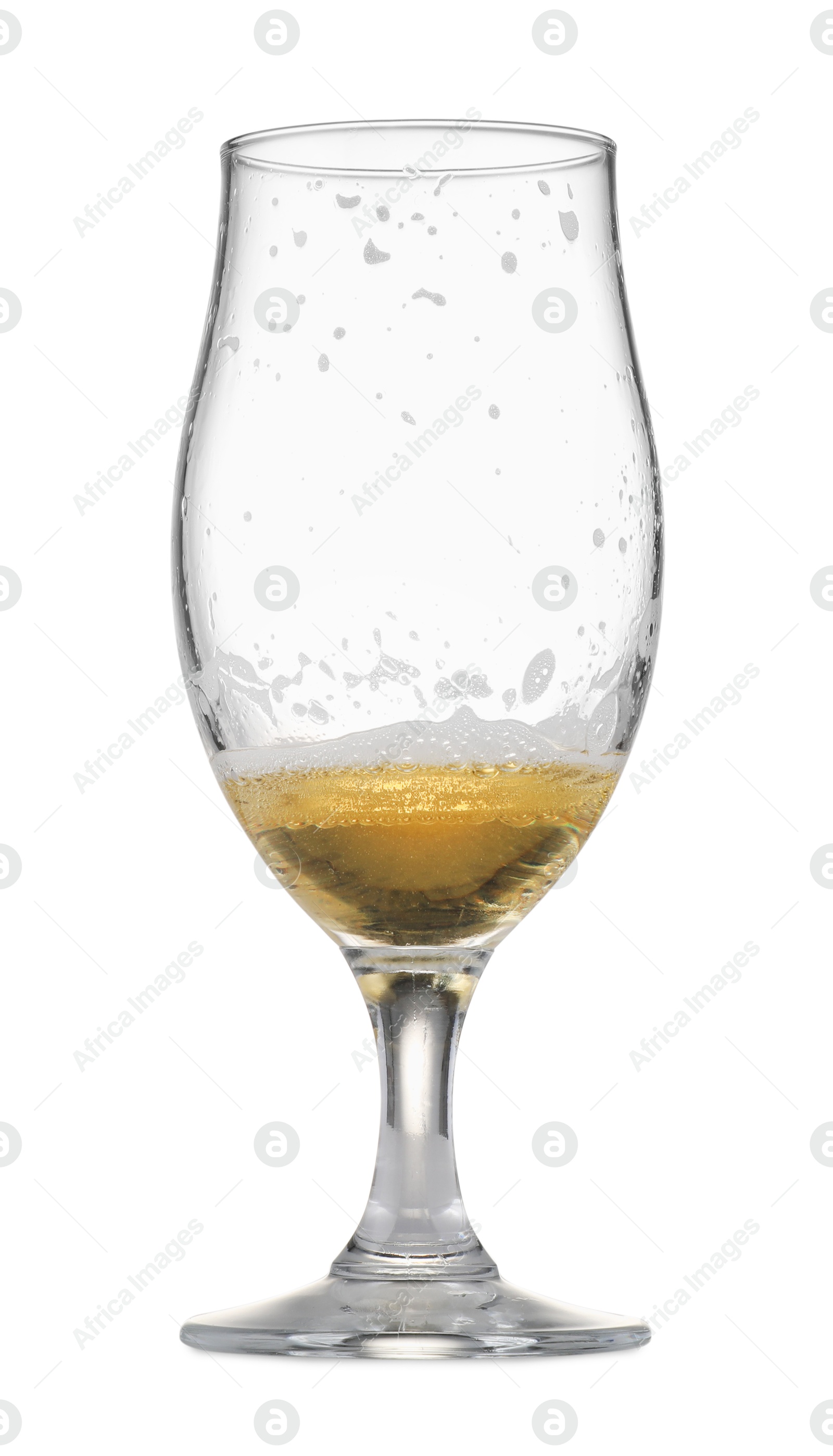 Photo of Almost empty glass of beer isolated on white