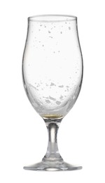 Photo of Almost empty glass of beer isolated on white