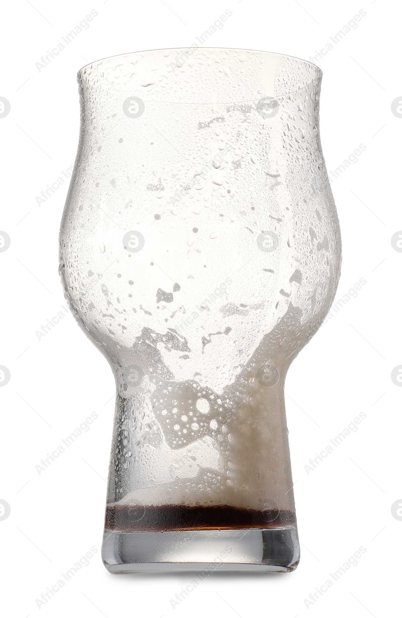 Photo of Almost empty glass of beer isolated on white