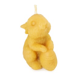 Photo of Yellow bunny-shaped candle isolated on white. Easter decor