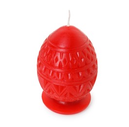 Photo of Red egg-shaped candle isolated on white. Easter decor