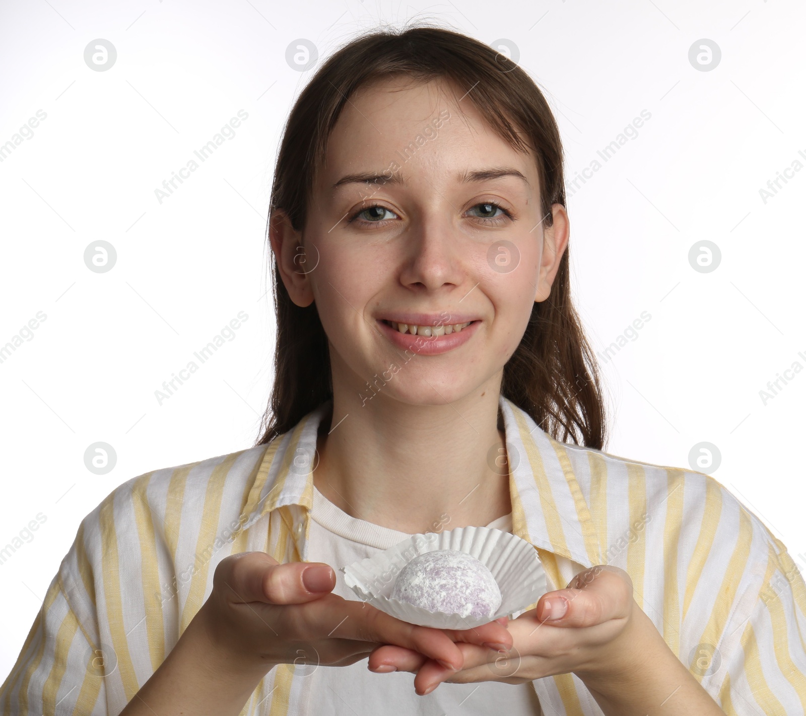 Photo of Smiling woman with tasty mochi on white background