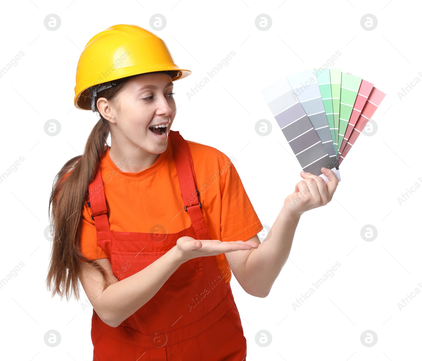 Photo of Professional painter with color selection chart on white background