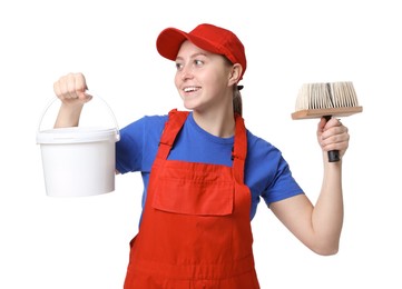 Photo of Professional painter with brush and bucket of paint on white background