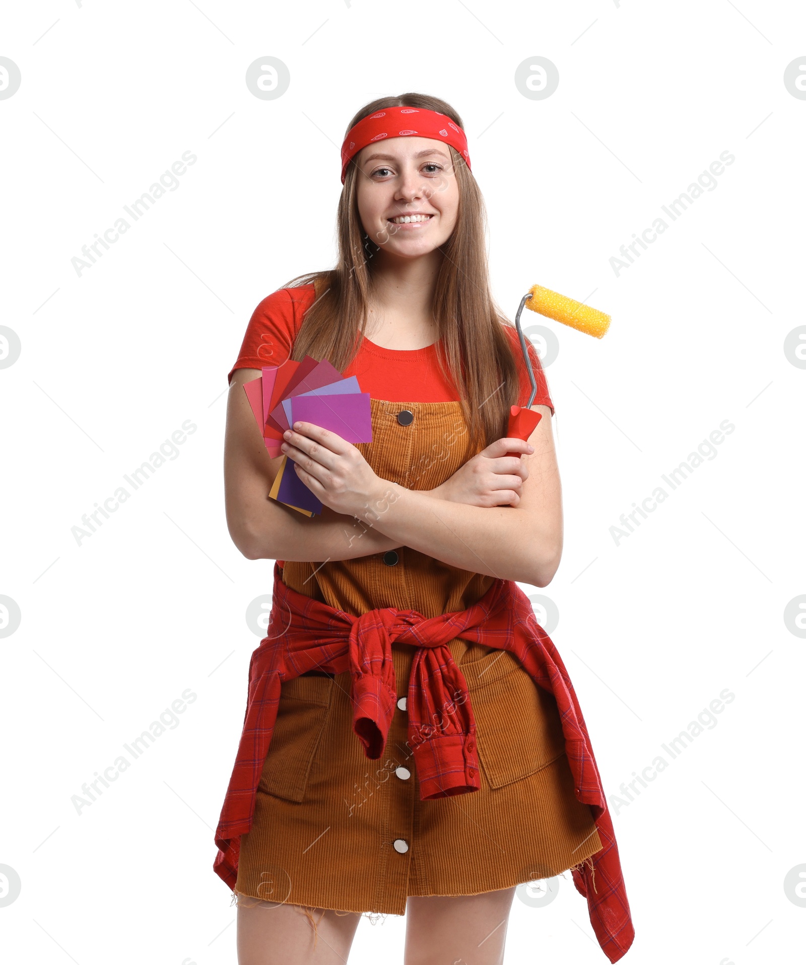 Photo of Woman with paint roller and color samples on white background