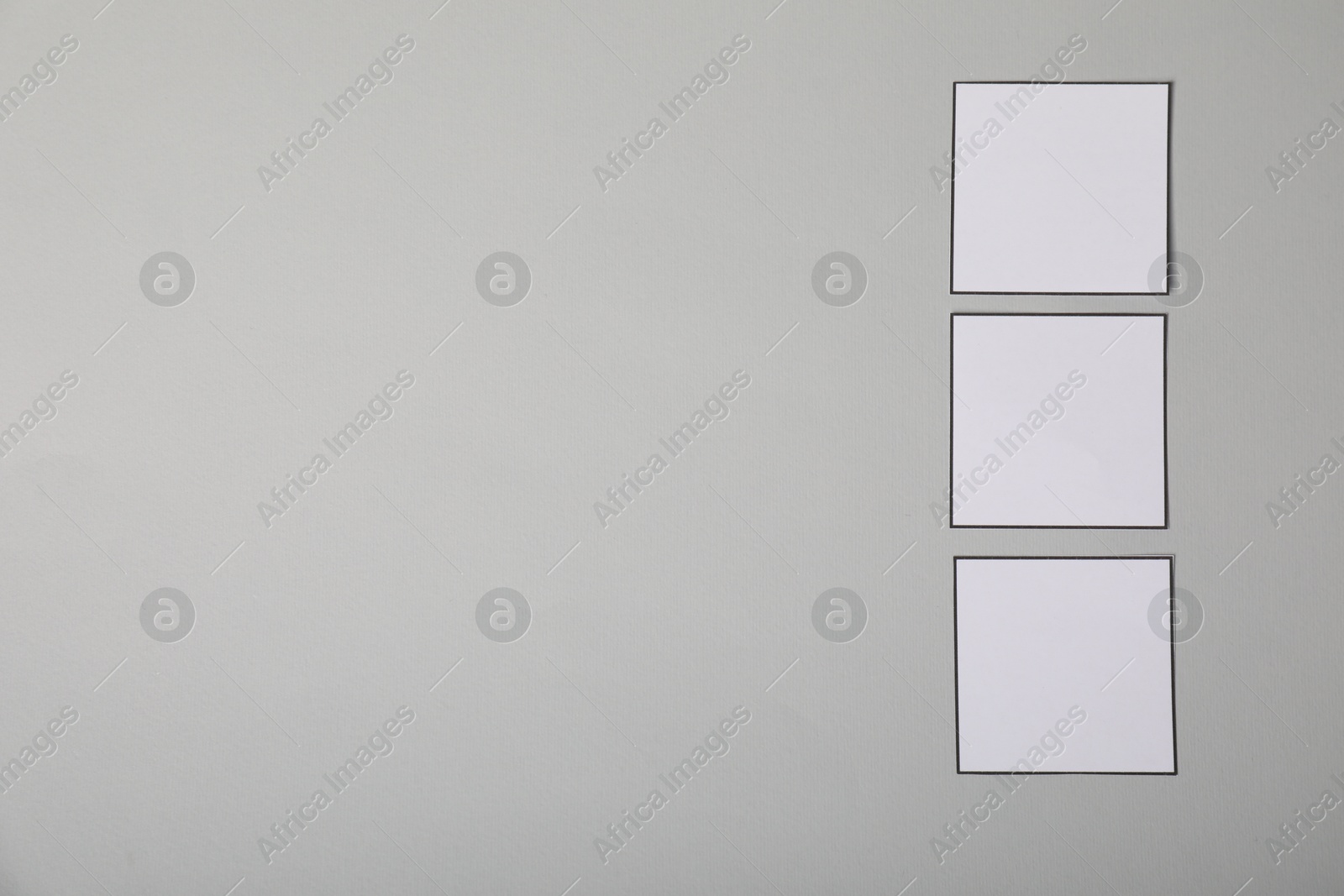 Photo of Empty checkboxes on grey background, flat lay. Space for text