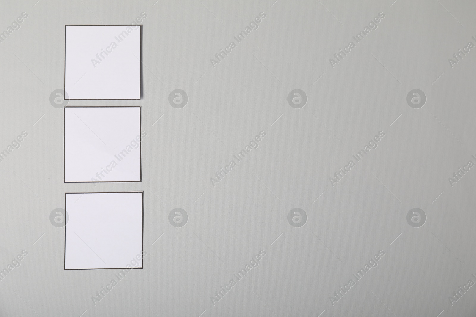 Photo of Empty checkboxes on grey background, flat lay. Space for text