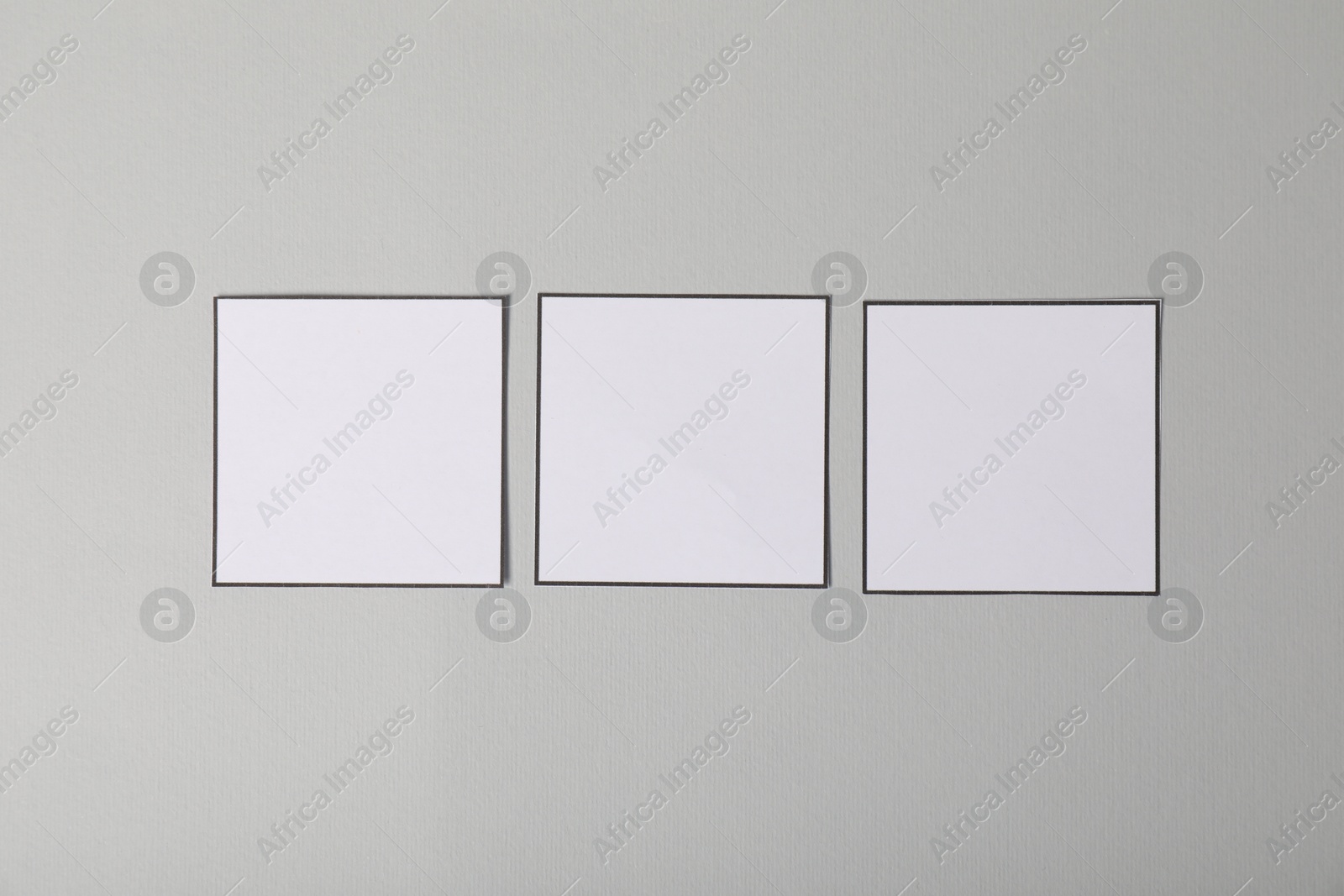 Photo of Empty checkboxes on grey background, flat lay