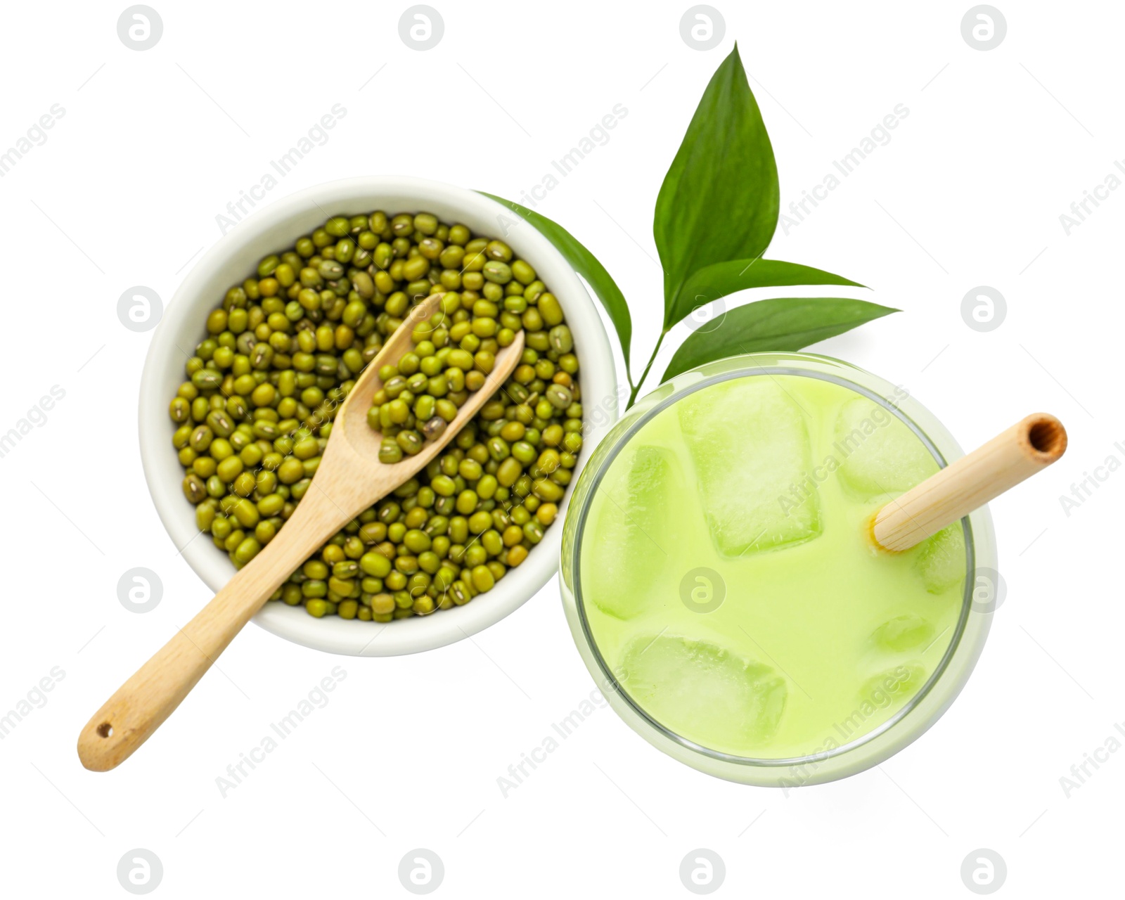Fresh mung bean juice in glass, seeds and green leaves isolated on white, top view Photo of Fresh mung bean juice in glass, seeds and green leaves isolated on white, top view