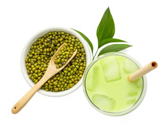 Photo of Fresh mung bean juice in glass, seeds and green leaves isolated on white, top view