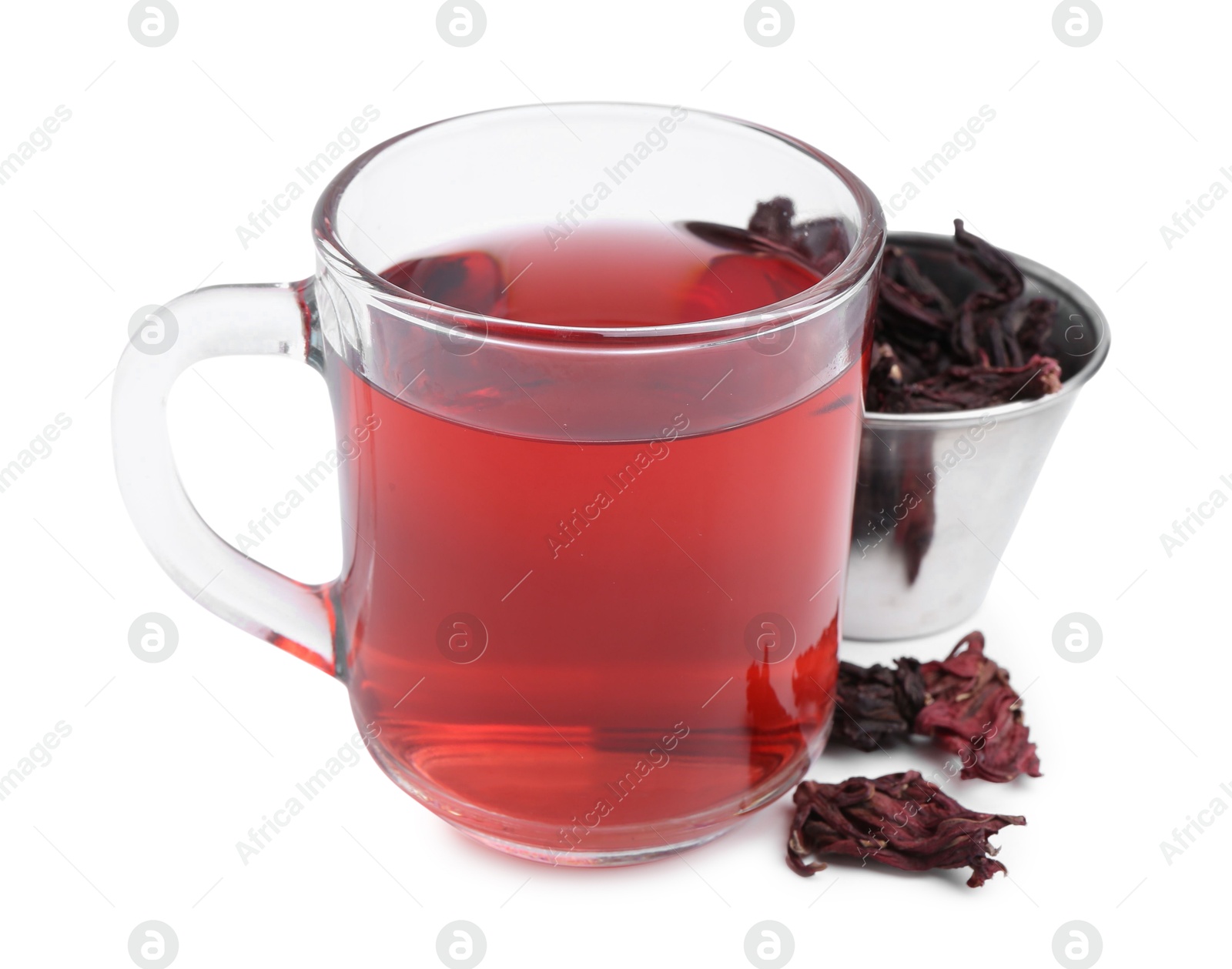 Photo of Delicious hibiscus tea in glass cup and dry roselle sepals isolated on white