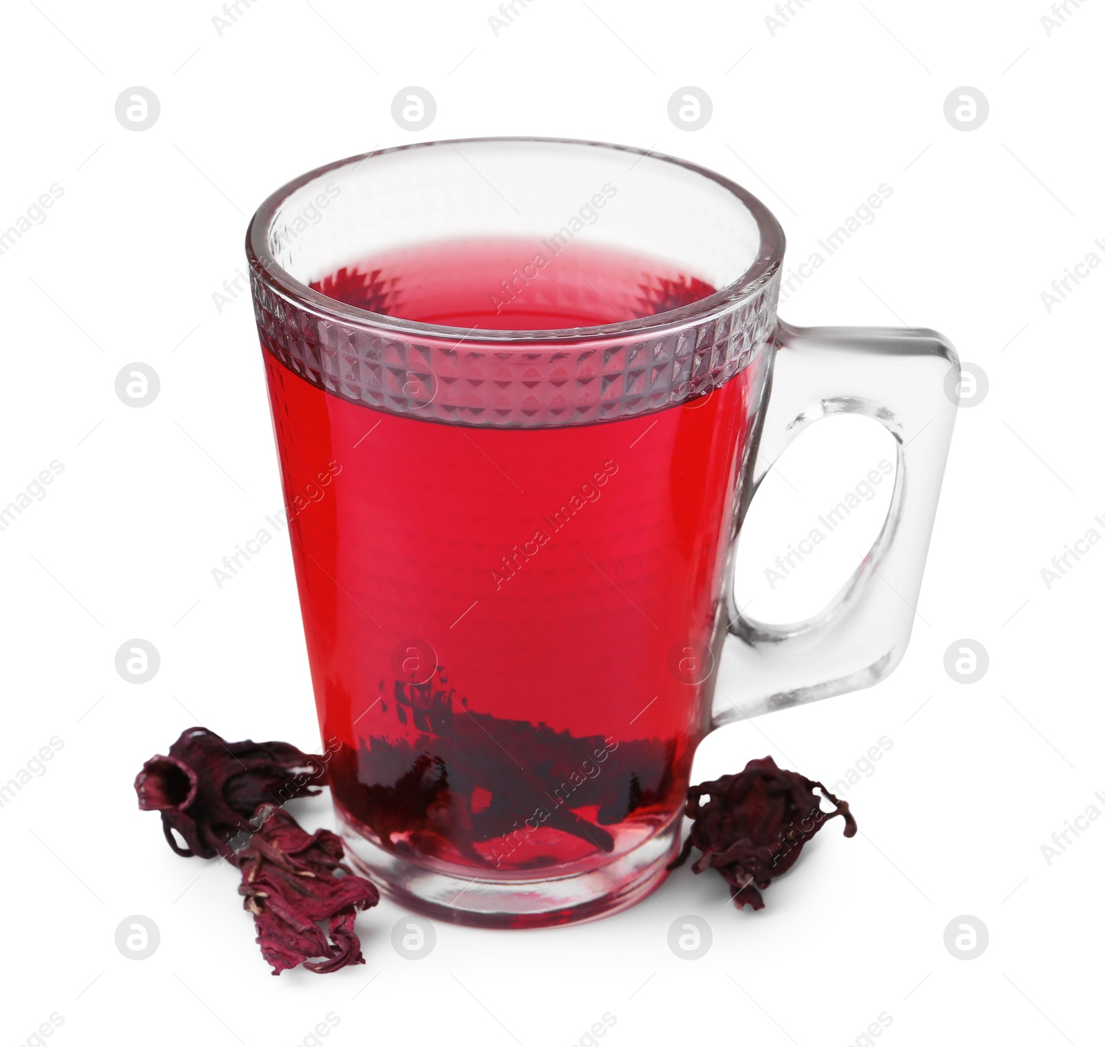 Photo of Delicious hibiscus tea in glass cup and dry roselle sepals isolated on white