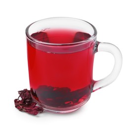 Photo of Delicious hibiscus tea in glass cup and dry roselle sepals isolated on white