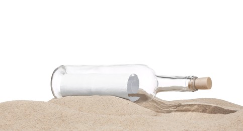 Photo of Rolled letter in corked glass bottle on sand against white background