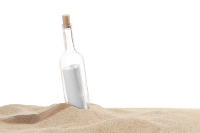 Photo of Rolled letter in corked glass bottle on sand against white background