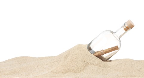 Photo of Rolled letter in corked glass bottle on sand against white background