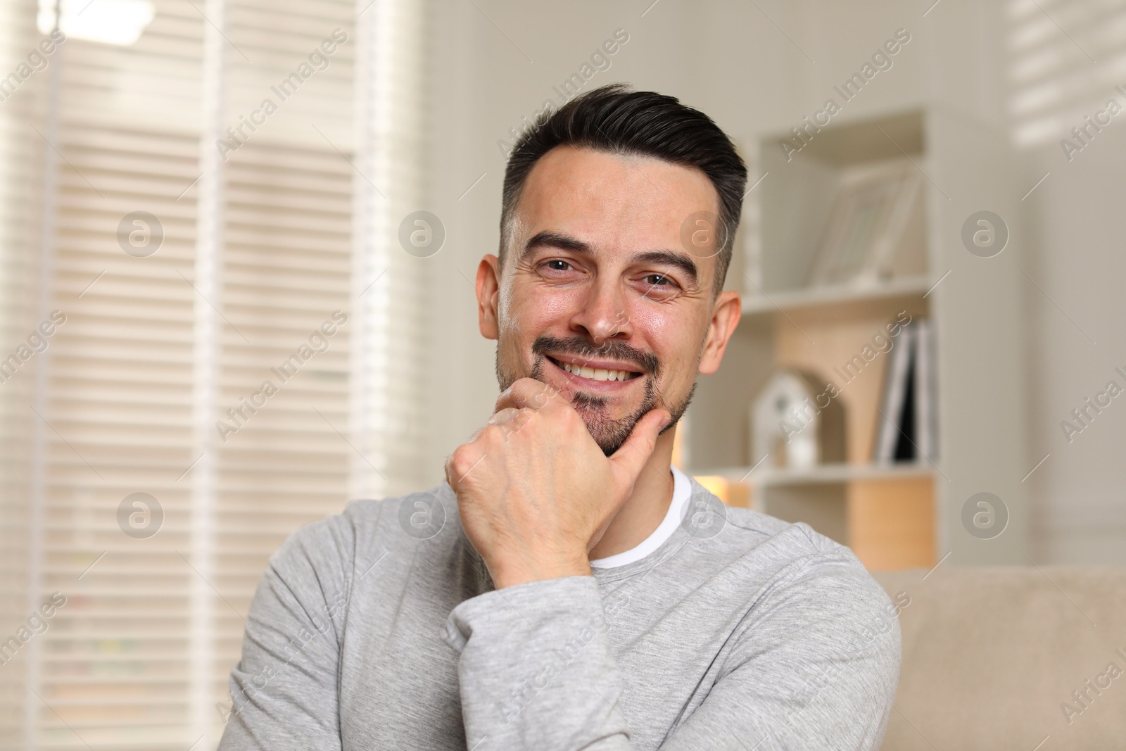 Photo of Portrait of handsome middle aged man indoors