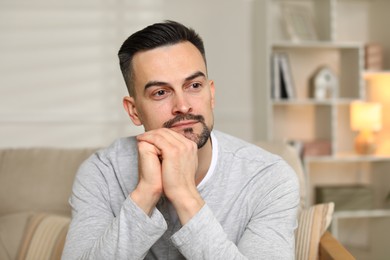 Photo of Portrait of handsome middle aged man indoors