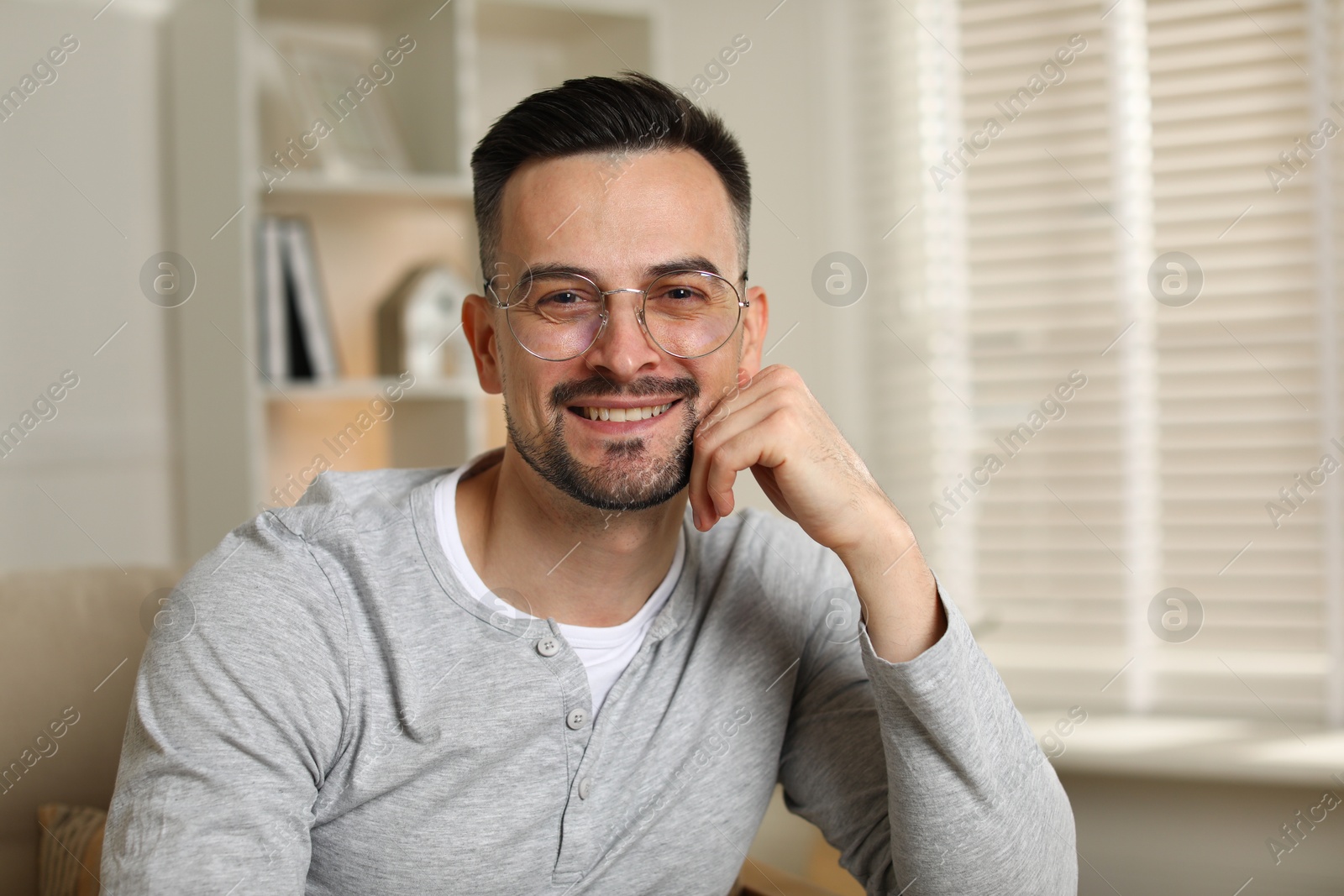 Photo of Portrait of handsome middle aged man indoors