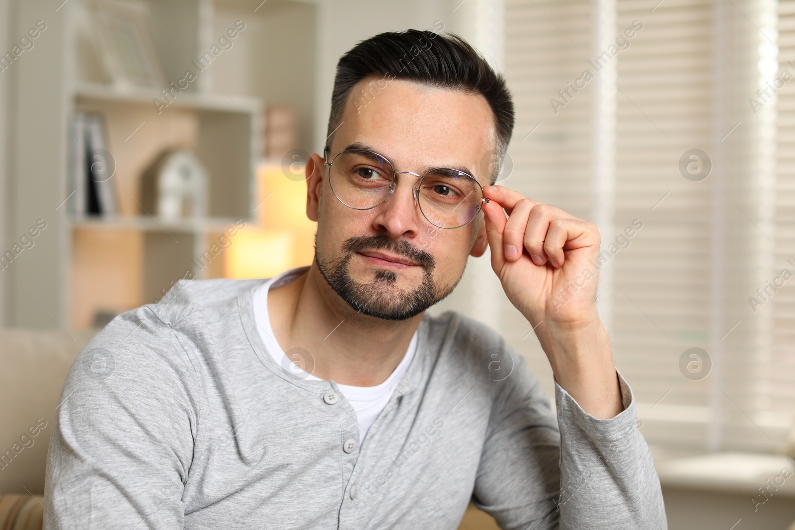 Photo of Portrait of handsome middle aged man indoors