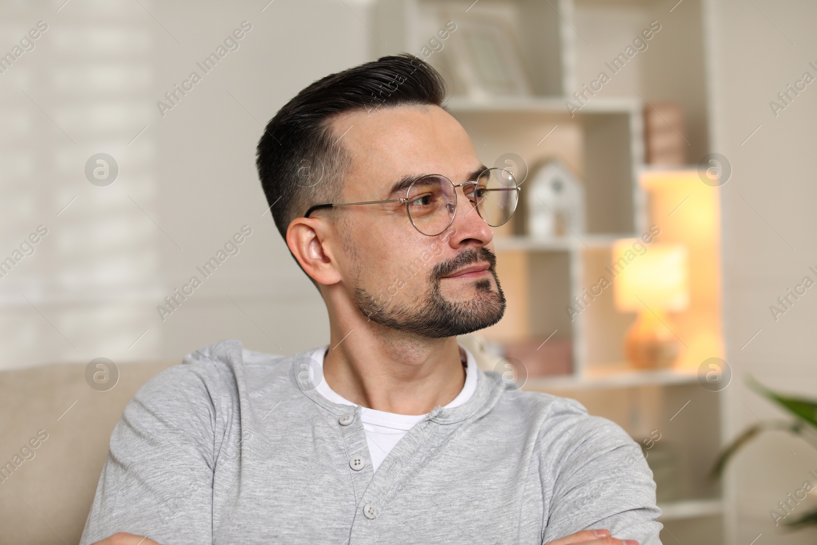 Photo of Portrait of handsome middle aged man indoors