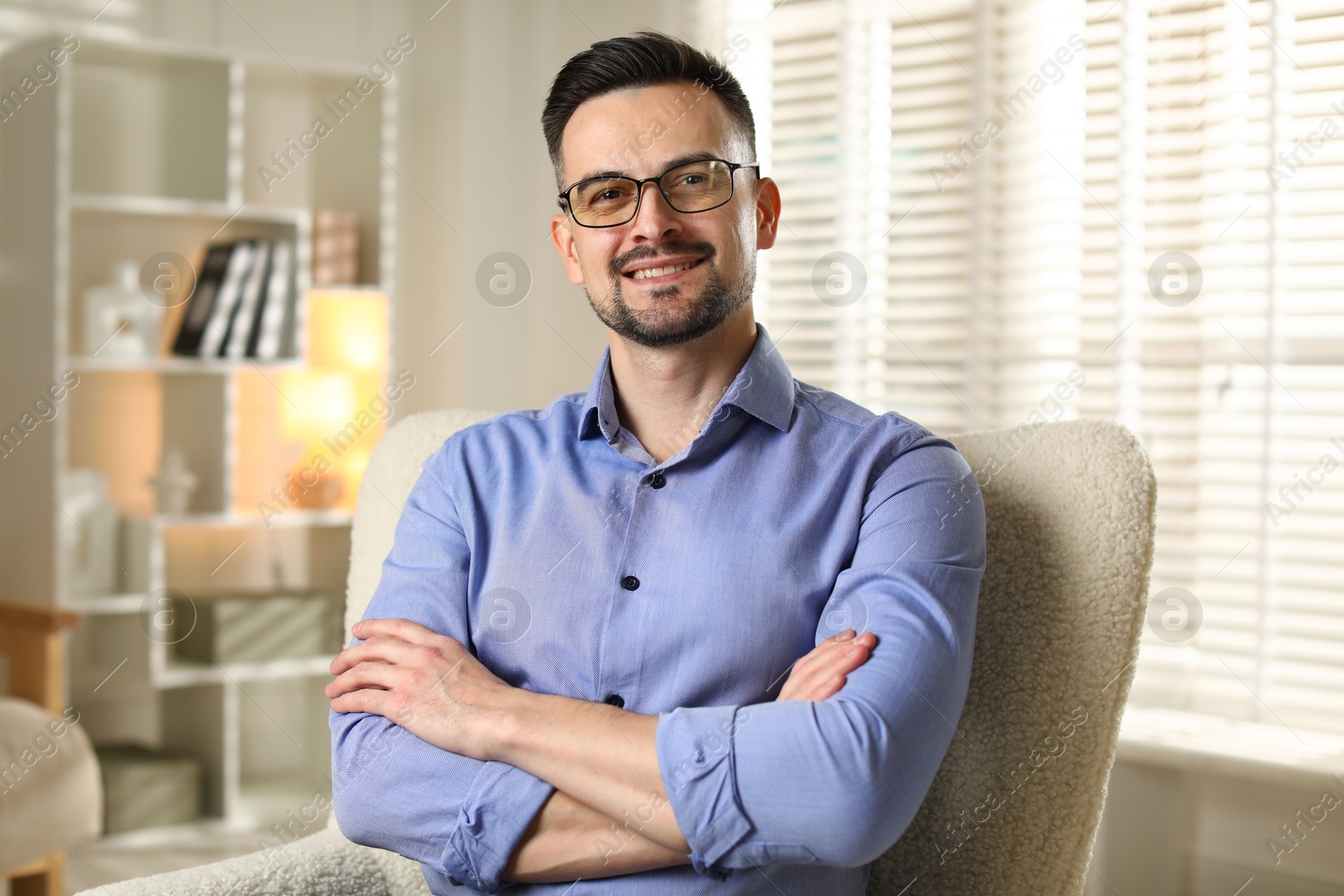 Photo of Portrait of handsome middle aged man indoors