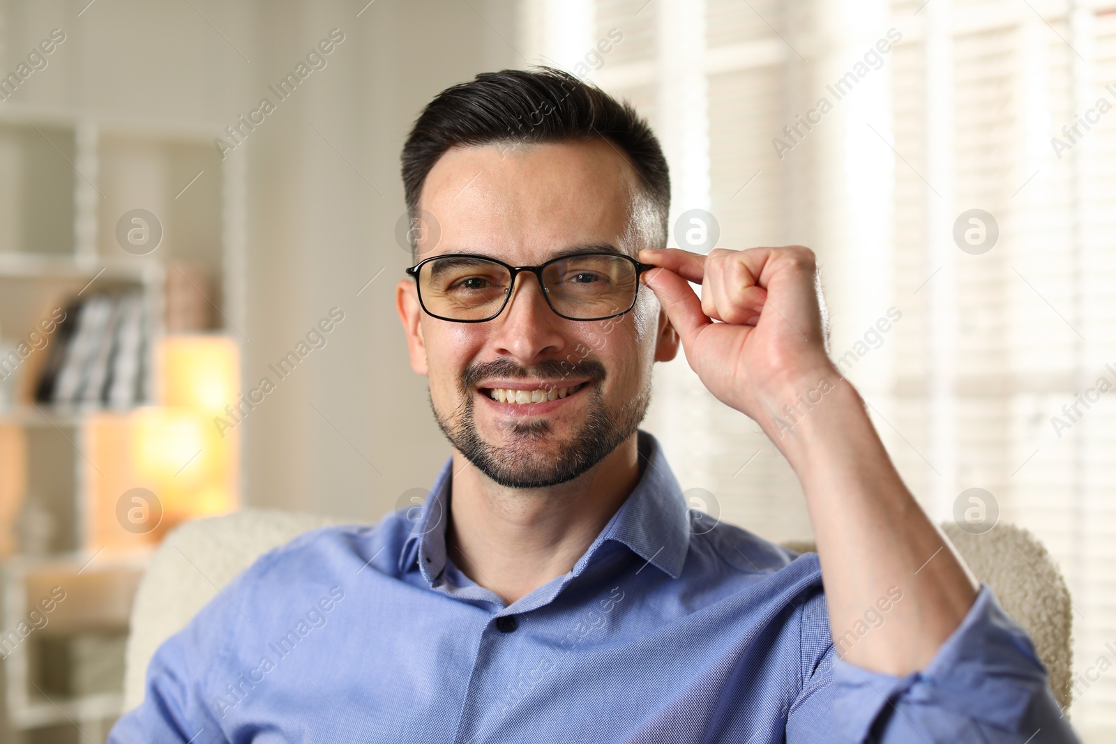 Photo of Portrait of handsome middle aged man indoors