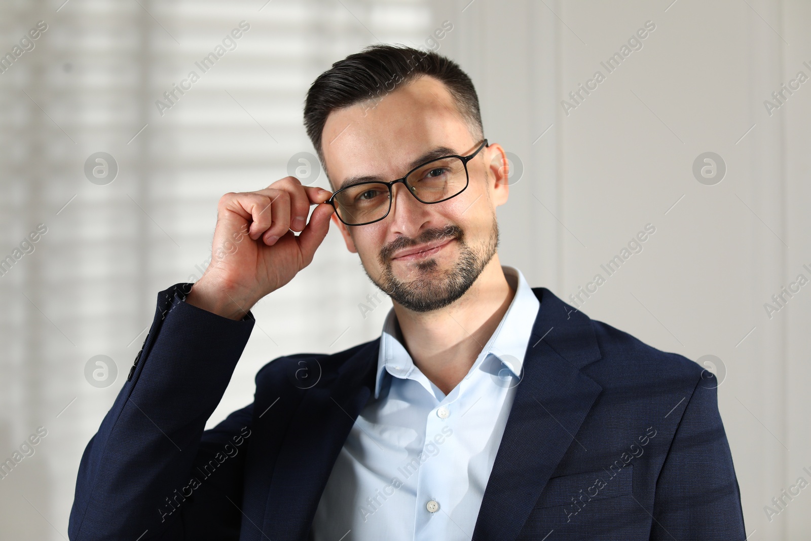 Photo of Portrait of handsome middle aged man indoors